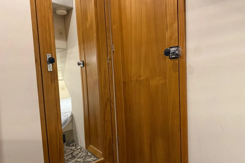 Touchdown Yacht Photos Pics Wooden interior doors on a 2000 Bayliner 3988 Command Bridge Motoryacht.