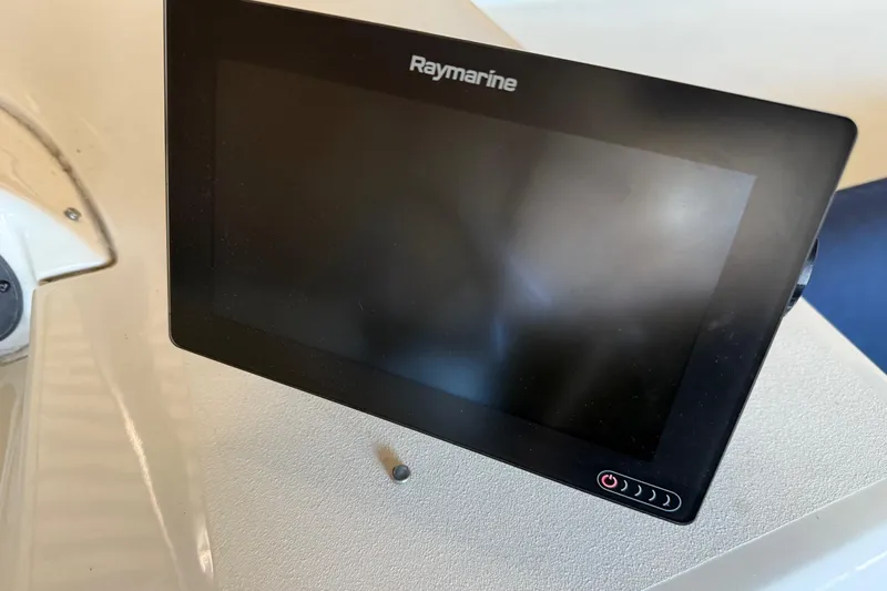Touchdown Yacht Photos Pics Raymarine display on 2000 Bayliner 3988 Command Bridge Motoryacht dashboard.