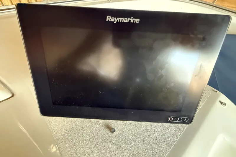 Touchdown Yacht Photos Pics Raymarine display on 2000 Bayliner 3988 Command Bridge Motoryacht dashboard.