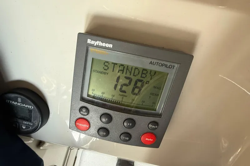 Touchdown Yacht Photos Pics Raytheon autopilot display on 2000 Bayliner 3988 Command Bridge Motoryacht.