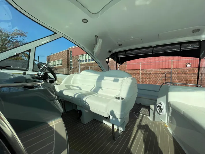  Yacht Photos Pics Interior of 2014 Formula 45 Yacht with white seating and modern design.