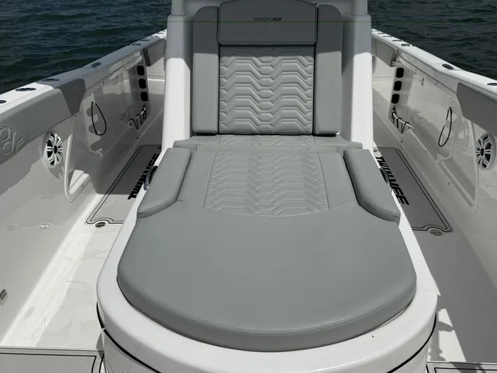 Katatak Yacht Photos Pics 2023 Twin Vee 280 GFX CC boat interior with gray cushioned seating.