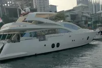 Luxury Aicon 85 yacht docked in urban marina, 2010 model.
