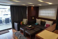 Luxurious interior of 2010 Aicon 85 yacht with modern seating and decor.