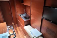 Interior of 2010 Aicon 85 yacht with kitchenette and seating area.