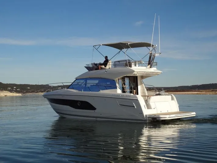  Yacht Photos Pics 2024 Prestige 420F yacht cruising on calm waters.