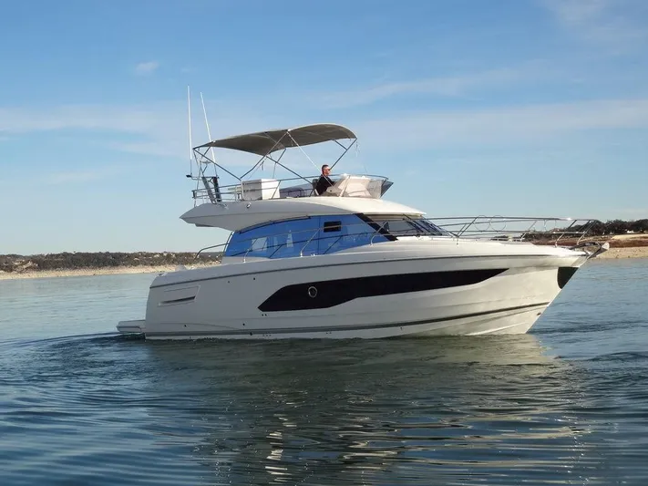  Yacht Photos Pics 2024 Prestige 420F yacht cruising on calm waters.