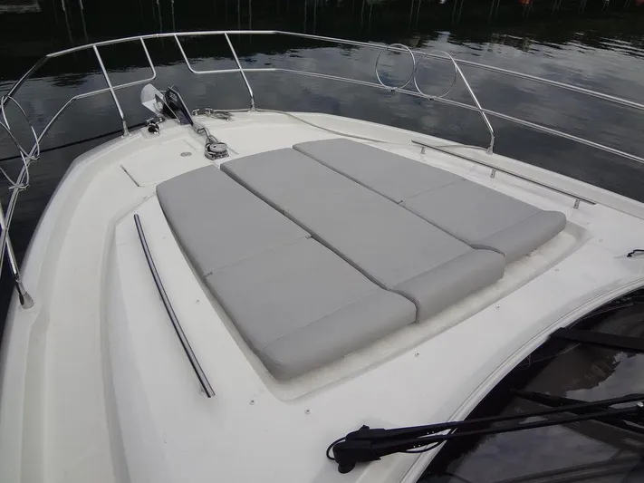  Yacht Photos Pics 2024 Prestige 420F yacht with spacious sunbathing area on the bow.