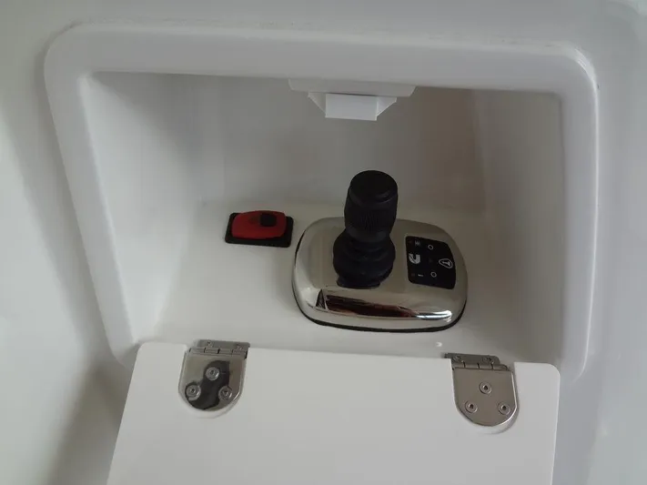  Yacht Photos Pics Control panel of 2024 Prestige 420F yacht with joystick and button.