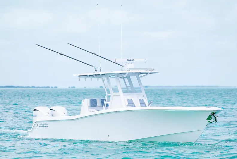  Yacht Photos Pics 2024 Invincible 33 Open Fisherman boat on the water.