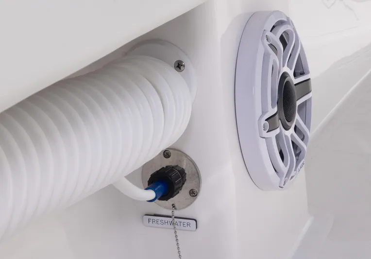  Yacht Photos Pics Close-up of freshwater hose and speaker on 2024 Invincible 33 Open Fisherman boat.