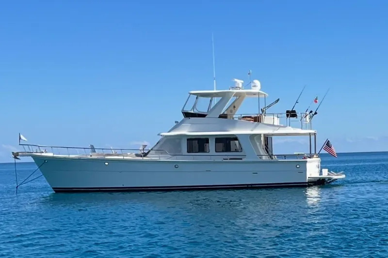 Pangea Yacht Photos Pics 2007 Norseman 560 Sedan yacht on calm blue ocean waters.