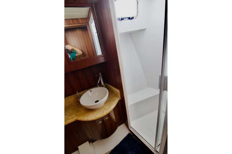 Pangea Yacht Photos Pics Bathroom interior of 2007 Norseman 560 Sedan yacht with sink and shower.