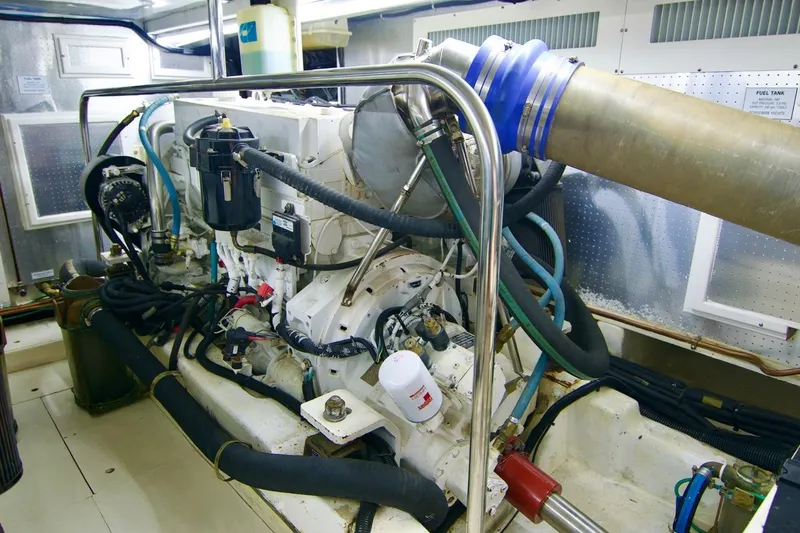Pangea Yacht Photos Pics Engine room of a 2007 Norseman 560 Sedan yacht, showcasing complex machinery and components.