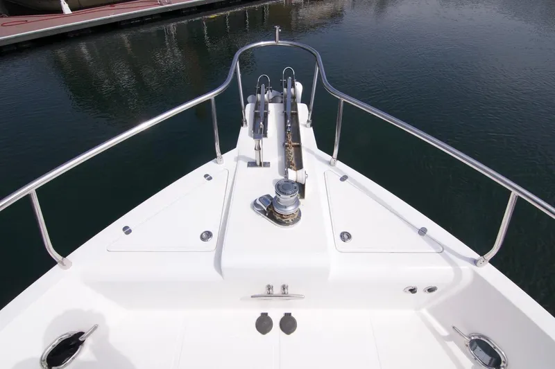 Pangea Yacht Photos Pics Bow view of 2007 Norseman 560 Sedan yacht, featuring stainless steel railings and anchor system.