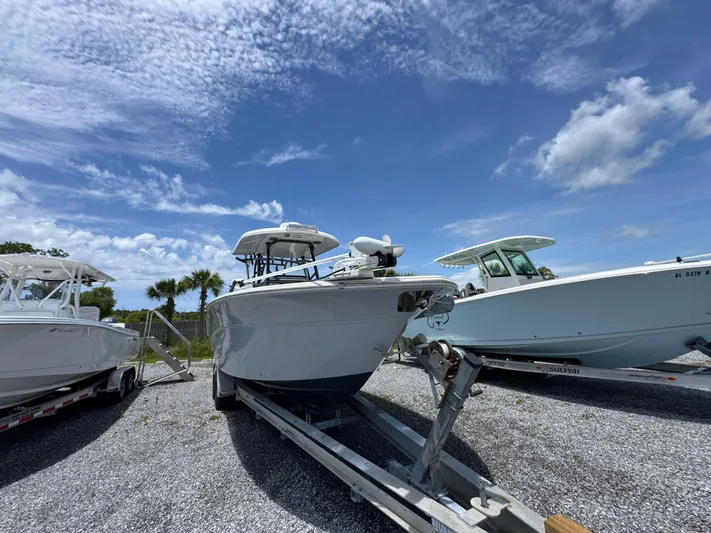  Yacht Photos Pics 2016 Sea Fox 288 Commander boat on trailer under blue sky.