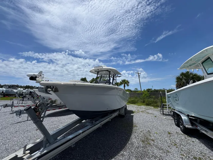 Yacht Photos Pics 2016 Sea Fox 288 Commander boat on trailer under a clear blue sky.