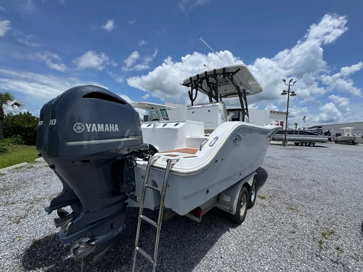  Yacht Photos Pics 2016 Sea Fox 288 Commander boat with Yamaha engine on trailer under blue sky.