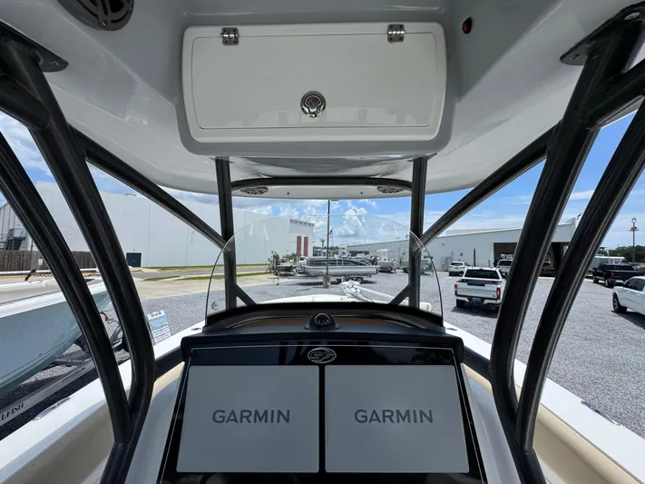  Yacht Photos Pics 2016 Sea Fox 288 Commander helm with dual Garmin displays, viewed from the cockpit.
