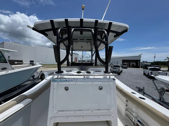  Yacht Photos Pics 2016 Sea Fox 288 Commander boat with T-top and center console, parked outdoors.