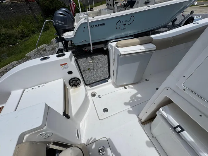  Yacht Photos Pics 2016 Sea Fox 288 Commander boat interior with seating and storage compartments.