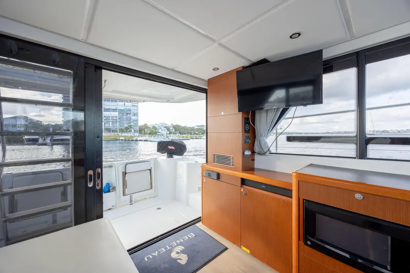 Smooth Yacht Photos Pics Interior of 2019 Beneteau Swift Trawler 30 with modern amenities and waterfront view.