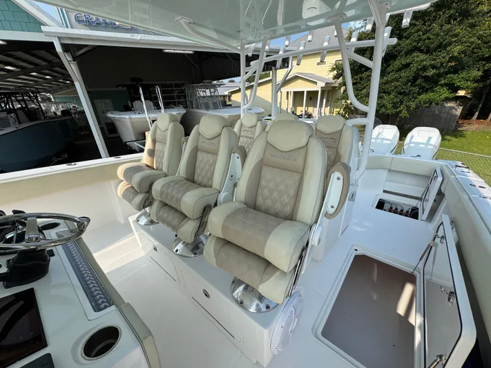  Yacht Photos Pics Luxurious seating on 2022 Invincible 40 Catamaran, showcasing premium design and comfort.