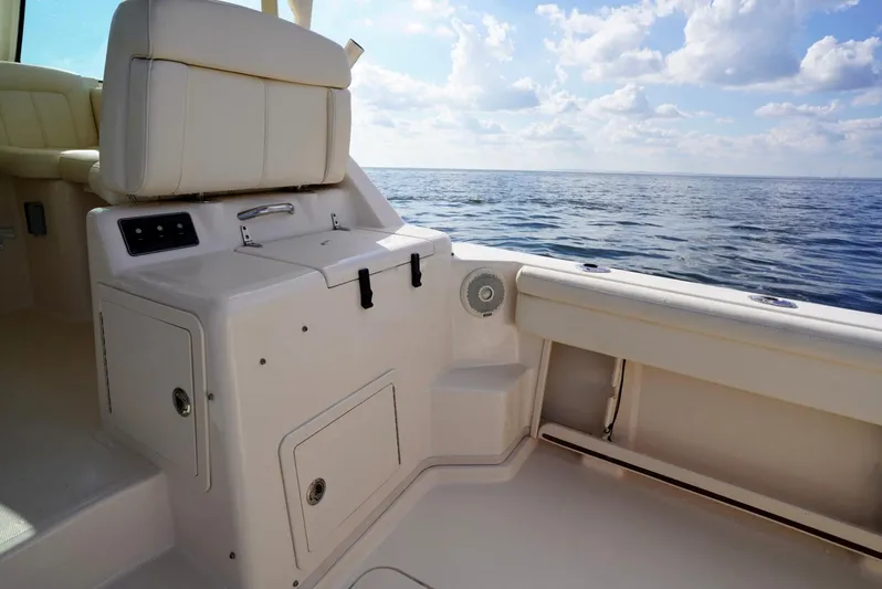  Yacht Photos Pics 2016 Grady-White Express 330 boat interior with ocean view and seating area.