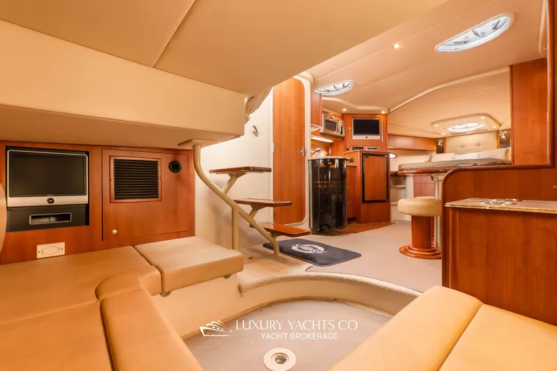  Yacht Photos Pics Luxurious interior of 2009 Cruisers Yachts 360 Express with elegant wood finishes.