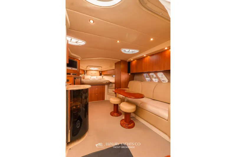  Yacht Photos Pics Luxurious interior of 2009 Cruisers Yachts 360 Express with elegant seating and wood finishes.