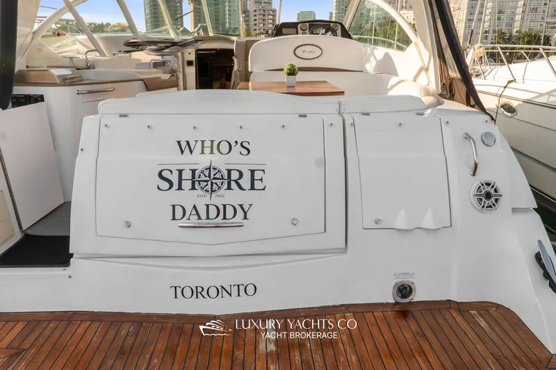  Yacht Photos Pics 2009 Cruisers Yachts 360 Express with "Who's Shore Daddy" text, docked in Toronto.