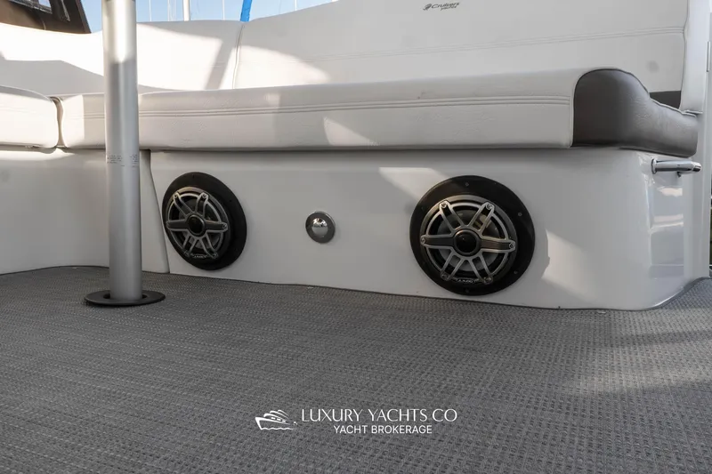  Yacht Photos Pics 2009 Cruisers Yachts 360 Express interior with speakers and seating.