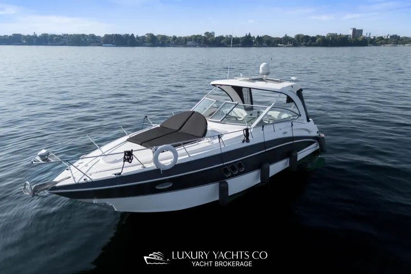  Yacht Photos Pics 2009 Cruisers Yachts 360 Express on calm water, showcasing sleek design and luxury features.