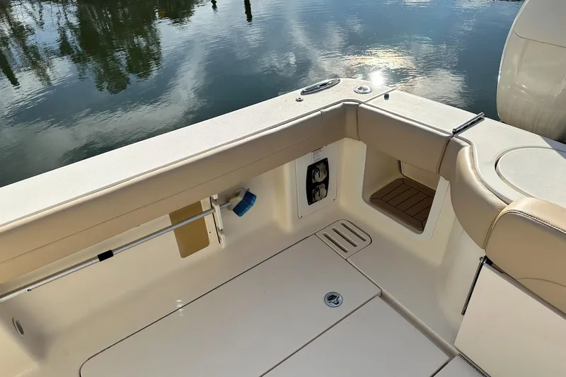  Yacht Photos Pics 2019 Scout 380 LXF boat interior with beige seating and water reflection.