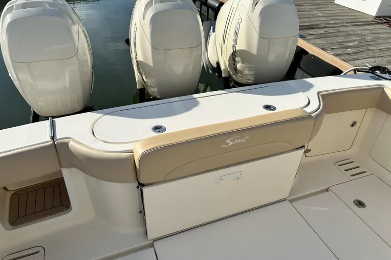  Yacht Photos Pics 2019 Scout 380 LXF boat with triple outboard engines at dock.
