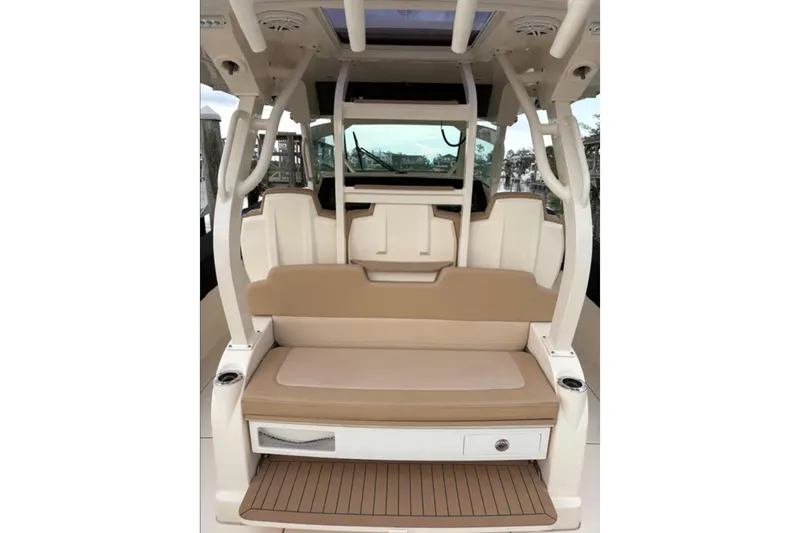  Yacht Photos Pics 2019 Scout 380 LXF boat interior with tan seating and modern design.