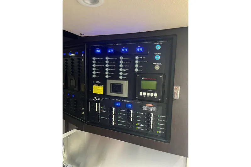  Yacht Photos Pics Control panel of a 2019 Scout 380 LXF boat with digital displays and switches.