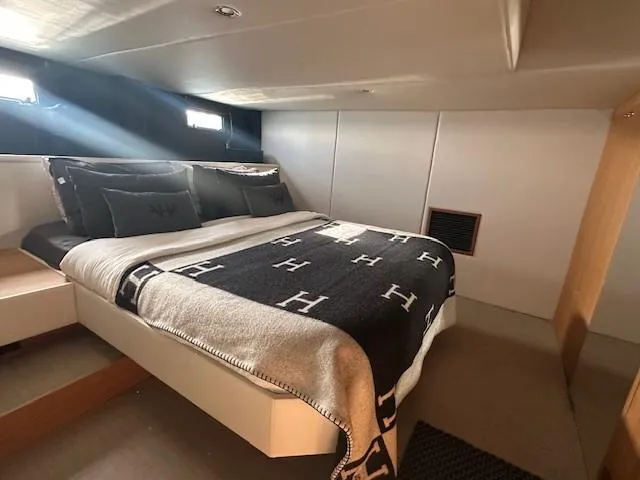  Yacht Photos Pics Luxurious bedroom interior of 2020 De Antonio Yachts D46 Cruiser with elegant bedding.