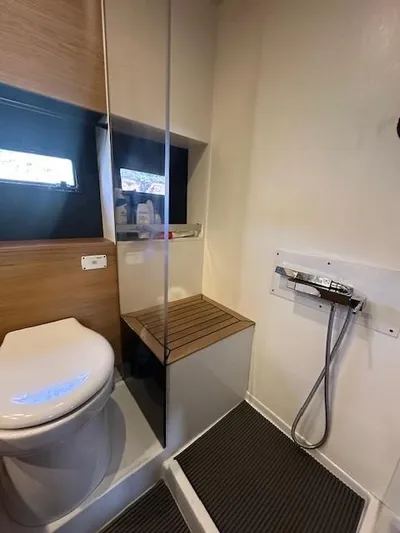  Yacht Photos Pics Bathroom interior of 2020 De Antonio Yachts D46 Cruiser with modern fixtures.