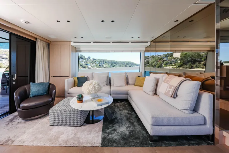Donnachaidh Yacht Photos Pics Luxurious interior of 2020 Sanlorenzo SX76 yacht with modern furnishings and scenic views.
