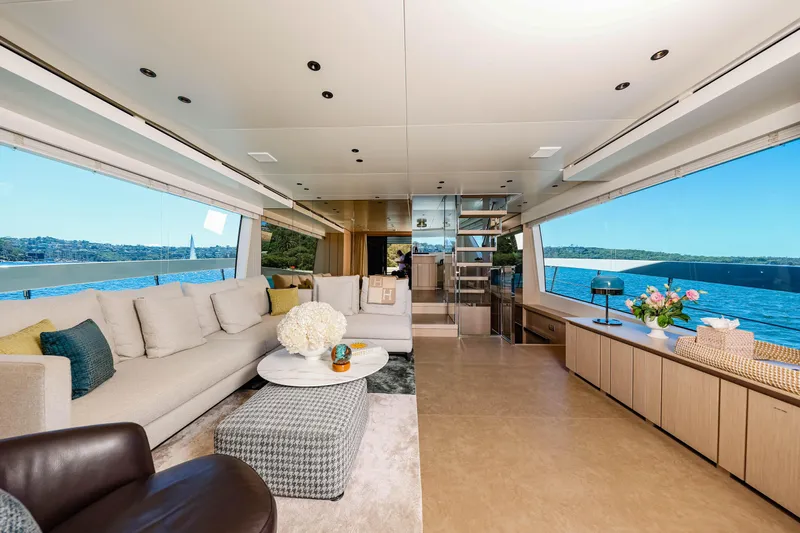 Donnachaidh Yacht Photos Pics Luxurious interior of 2020 Sanlorenzo SX76 yacht with panoramic ocean views and elegant furnishings.