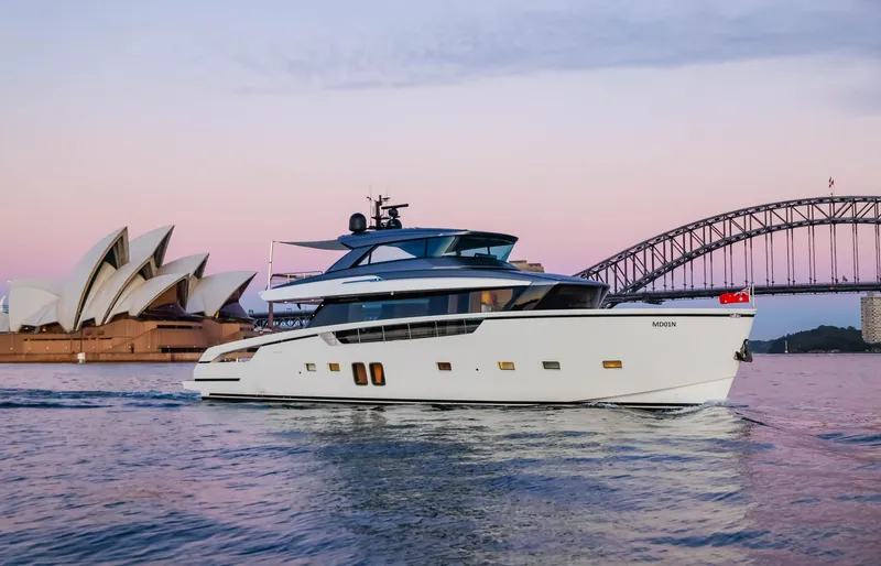 Donnachaidh Yacht Photos Pics Sanlorenzo SX76 yacht cruising near Sydney Opera House and Harbour Bridge at sunset, 2020 model.