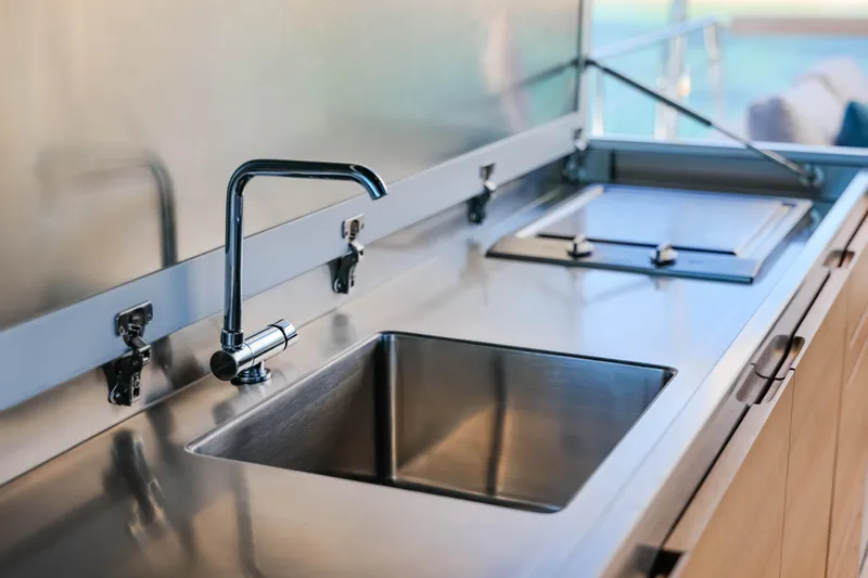 Donnachaidh Yacht Photos Pics Modern stainless steel kitchen sink and stove on 2020 Sanlorenzo SX76 yacht.