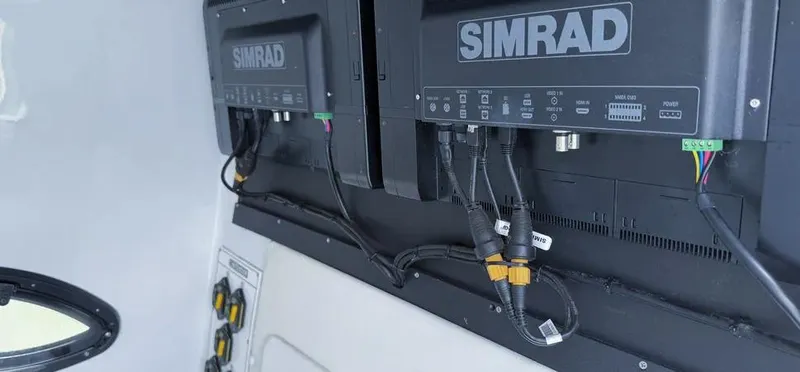  Yacht Photos Pics Simrad electronics on 2022 Contender 39 ST boat, showcasing advanced navigation systems.