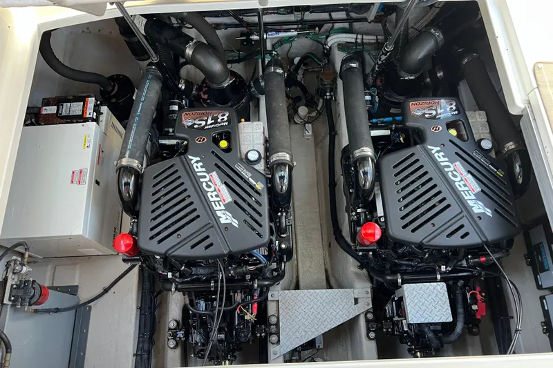  Yacht Photos Pics Engine compartment of a 2005 Sea Ray 390 Express Cruiser with twin Mercury engines.
