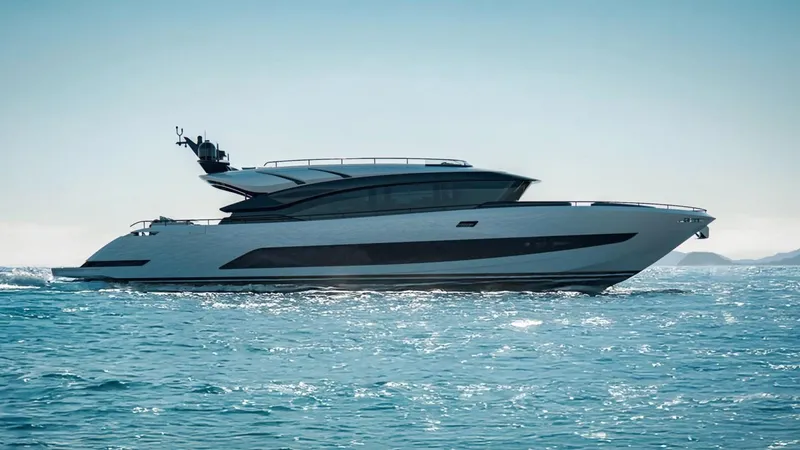  Yacht Photos Pics Luxurious 2025 AB 95 yacht cruising on open sea under clear sky.