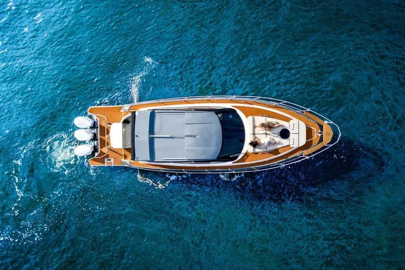  Yacht Photos Pics Aerial view of Hanover 415 yacht cruising on blue ocean waters, 2025 model.