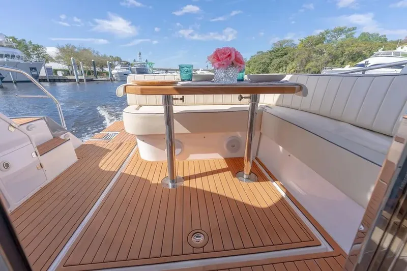 Yacht Photos Pics Luxurious Hanover 415 yacht deck with seating and table, 2025 model.