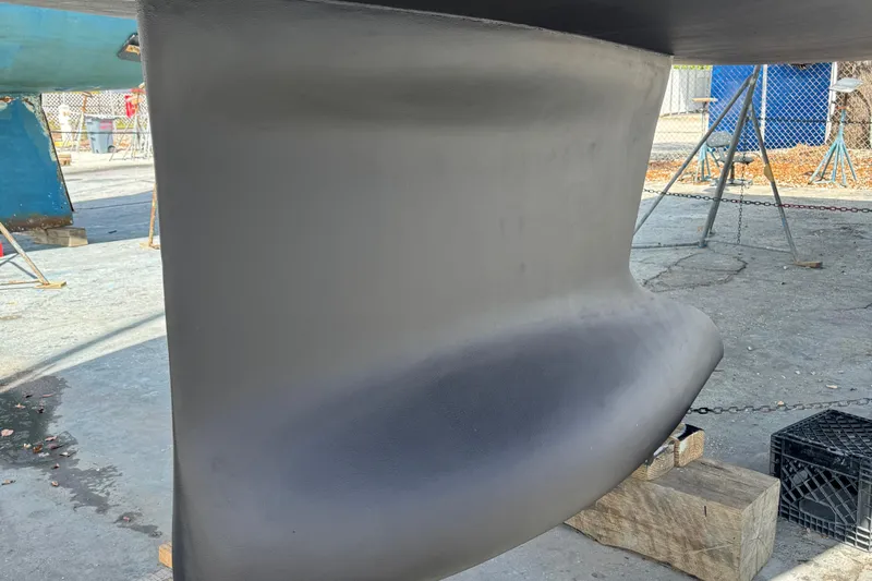Deli Mavi Yacht Photos Pics Close-up of 2019 Beneteau Oceanis 41.1 keel in a boatyard setting.