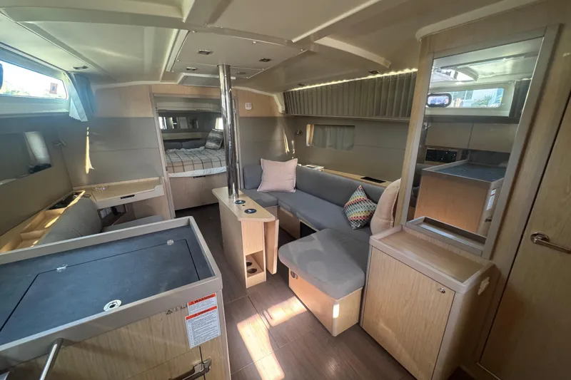 Deli Mavi Yacht Photos Pics 2019 Beneteau Oceanis 41.1 interior with modern furnishings and natural light.